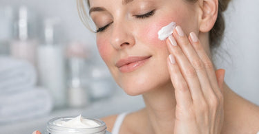 Close-up of a serene woman's face with calm, even skin tone, showcasing the effective results of professional rosacea treatment with soothing creams.