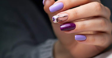 Trendy purple nail designs with gradient, metallic, and floral accents.