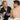 Professional esthetician applying hard wax to a male client's back for efficient large surface area hair removal