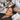 High frequency wand comb attachment being used on scalp for hair growth and dandruff treatment in a professional salon