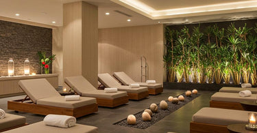 Luxury relaxation room loungers in a serene spa setting