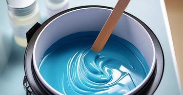 Wax pot in a waxing studio with blue wax