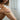 Professional esthetician preparing a client for waxing treatment