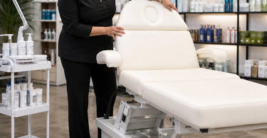 Heavy duty facial bed and esthetician demonstrating stability with hand pressure