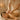 A spa professional's hands assessing tissue density and movement on a client's back during a massage treatment