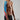Kinesiology tape applied to a shoulder for pain relief and muscle support