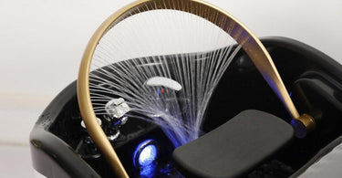 A relaxing head spa treatment in progress, showcasing a client enjoying a scalp massage and hair treatment.