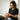 Therapist performing Craniosacral Therapy on a client