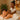 Relaxing spa treatment room with massage table and candles showcasing popular spa services