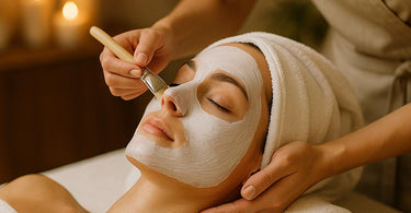 Relaxing spa treatment room with massage table and candles