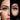 Close-up of dramatic fake eyelashes applied professionally