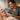 A compassionate spa professional offering a calm, supportive presence to a client in a serene treatment room