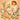 Professional spa therapist consulting with client about skincare referral needs