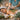 A calming spa treatment scene showcasing hands performing a gentle massage on a client&rsquo;s back, symbolizing relaxation and anti-inflammatory care.