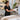 Professional spa treatment room with neatly prepared warm towels ready for a comfortable client service