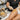 Eco-friendly biodegradable sponges and protective gloves for professional spa and salon use displayed on a bamboo surface