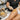 Eco-friendly biodegradable sponges and protective gloves for professional spa and salon use displayed on a bamboo surface