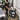 A salon trolley parked safely away from electrical cords to prevent tripping and electrical hazards in a spa or salon setting.