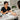 A client's arm is correctly positioned on a manicure table armrest, demonstrating the proper form for a relaxing and professional nail service.