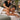 Professional massage therapy session highlighting comfortable arm positioning and client support on a massage table