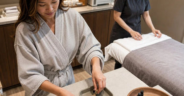 A client's jewelry and personal valuables elegantly displayed on a mirrored tray at a salon or spa station, promoting safety and peace of mind.