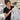 Disposable spa gown showing fabric ties and seam attachment areas that can tear during professional salon and spa treatments