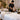 Professional beauty training station with standardized manikin setup and organized tools for consistent education