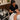 Spa professional applying a luxurious finishing touch to a client in a serene spa environment