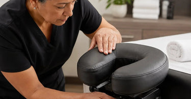 A detailed infographic showing how to inspect a massage face cradle for loose screws, worn padding, and cracks to ensure client safety.