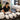 Stack of fresh white massage linens arranged on a spa treatment table representing a organized linen rotation plan for a professional massage room.