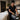 Serene and organized massage room featuring a quiet, discreet storage area for used tools, embodying spa cleanliness and professional luxury.