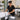 Neatly folded massage sheets organized in service-ready sets for spa and massage therapy professionals