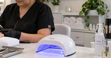 Professional nail lamp with proper airflow clearance on a manicure station, demonstrating why nail lamps need space around them for proper ventilation