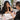 Professional nail technician adjusting nail length during a salon manicure service