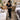 Packing peanuts and shipping debris near opened salon and spa supply boxes in a professional receiving area
