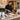 Professional spa and salon reception counter with everyday front desk clutter, illustrating why reception areas accumulate supplies, paperwork, and retail products.
