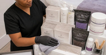 A close-up image of a dusty shelf in a beauty salon, with various retail products like lotions and beauty tools covered in a layer of dust, symbolizing lost sales and poor inventory management.