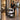 Professional rolling spa cart moving through a quiet salon or spa hallway