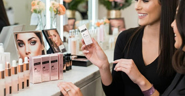 Babe Eyelash Serum displayed on a salon counter
