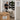 Warning sign on a door reading 'Clean Treatment Area, Shipment Boxes Do Not Enter', emphasizing salon and spa hygiene and safety protocols.