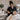 A serene spa treatment room with dim lighting, a comfortable massage table, and a towel steamer, representing the luxury of a silent appointment experience
