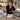 An image showing a busy salon schedule grid disrupted by a broken piece of equipment.