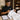 A pristine white spa robe meticulously inspected and neatly presented on a wooden hanger, symbolizing pure luxury and hygiene