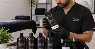 Professional spray tan solution bottle with clear open-date label showing expiration tracking for salon inventory management
