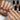 Professional manicure featuring flawless nude nail polish on well-groomed hands