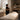 A split image showing a bright, clinical consultation room lighting on one side and a warm, relaxing service room lighting on the other, illustrating the transition in a spa treatment room.