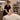 Spa treatment room with massage table and ambient lighting illustrating the importance of room temperature for client comfort.