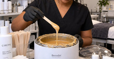 Professional salon wax warmer with hardened wax buildup around the rim, illustrating common causes of wax residue and equipment cleaning maintenance