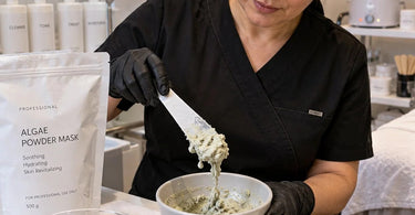Professional powder facial mask preparation with a spatula and mixing bowl, demonstrating how unwanted moisture can cause clumping and affect mask texture during spa treatments