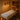 Professional spa and salon lighting setup showing a magnifying lamp and LED task lighting on a modern treatment table